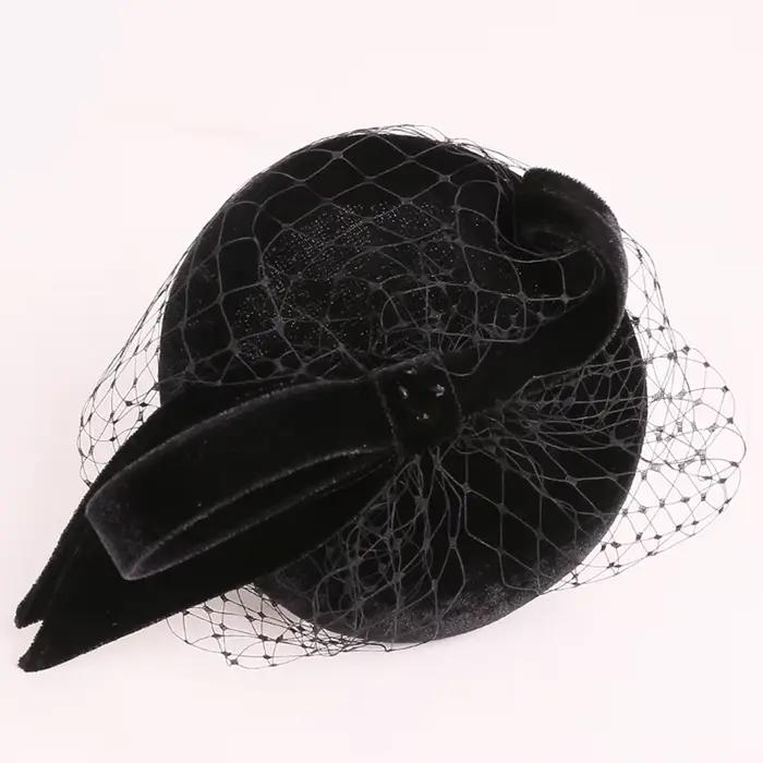 Chapeau fascinateur en feutre de laine 100% noir avec voile et nœud