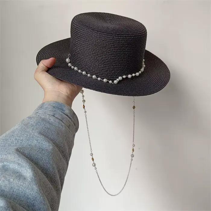 Chapeau seau en paille avec chaîne de perles