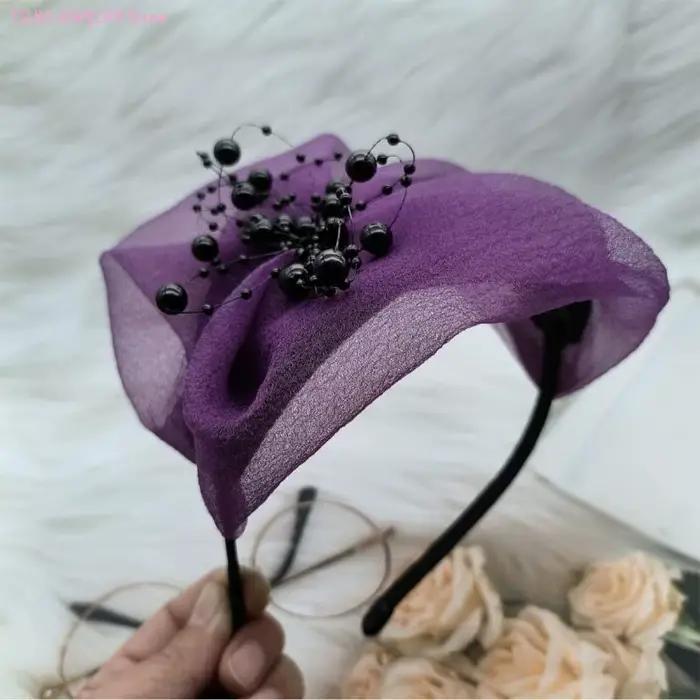 62KE – chapeau fascinant à nœud papillon élégant