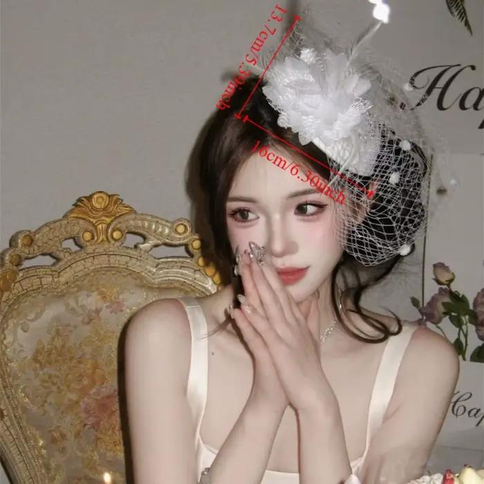 Chapeau fascinateur Vintage en plumes de fleurs