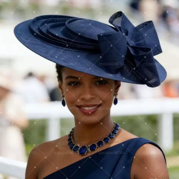 Grand chapeau fascinateur orange avec nœud et pince pour femme