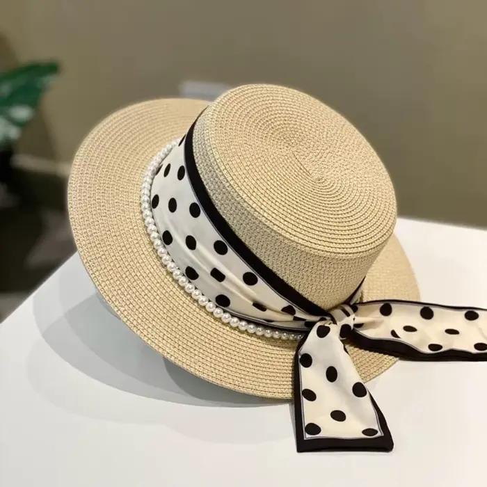 Chapeau de plage élégant en paille tressée avec ruban à pois