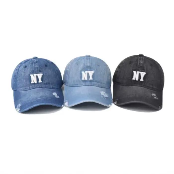 Chapeau de baseball en jean à trous