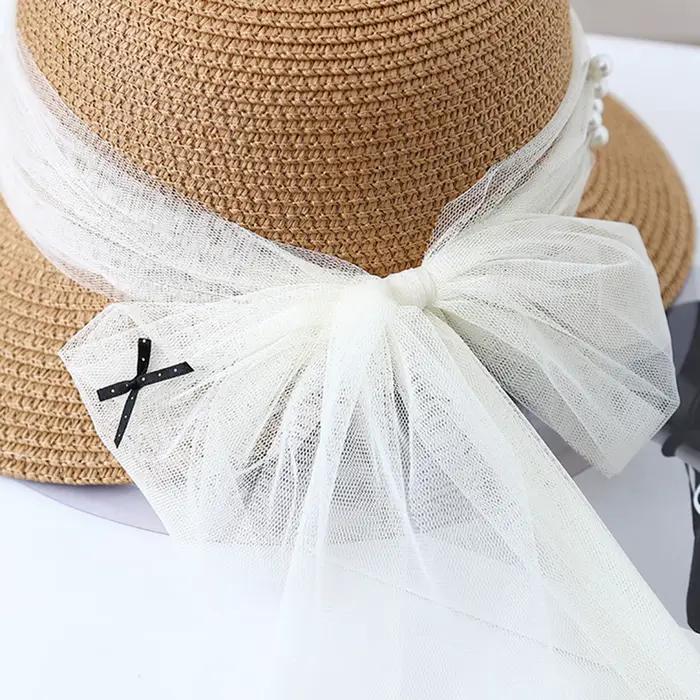 Chapeau de soleil en paille élégant avec nœud en maille de perles pour femmes
