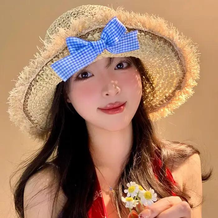 Chapeau de soleil élégant d'été avec grand nœud