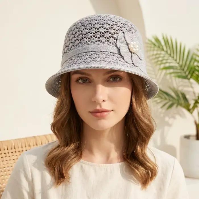Chapeau de soleil élégant ajouré avec décoration florale