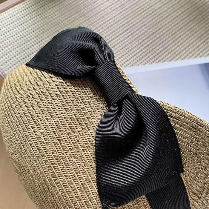 Chapeau de paille décontracté à large bord avec nœud tressé