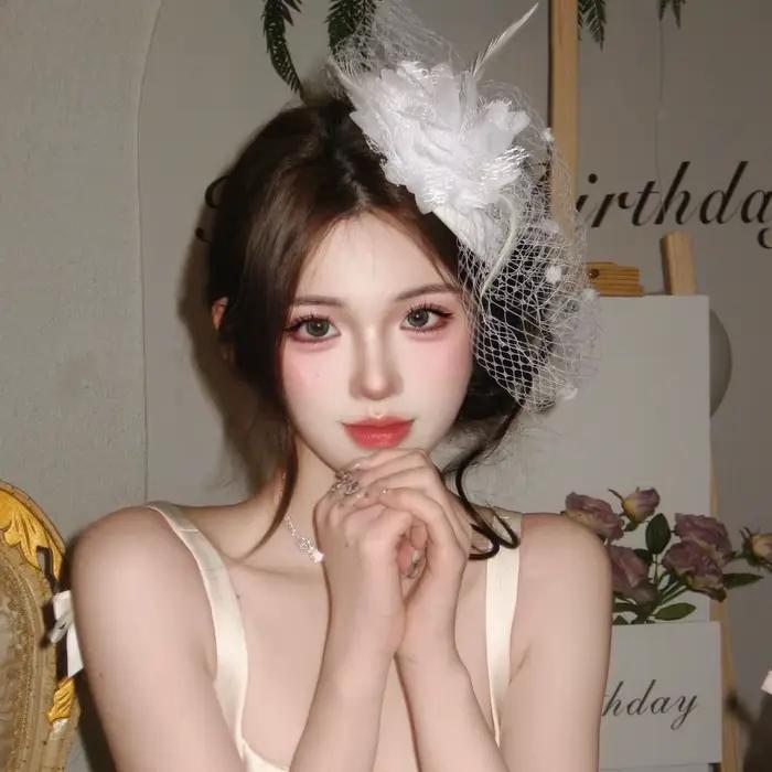 Chapeau fascinateur Vintage en plumes de fleurs