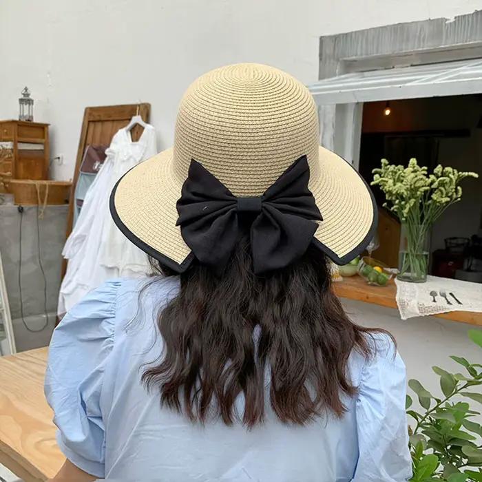 Chapeau de paille à large bord pour femmes avec nœud papillon