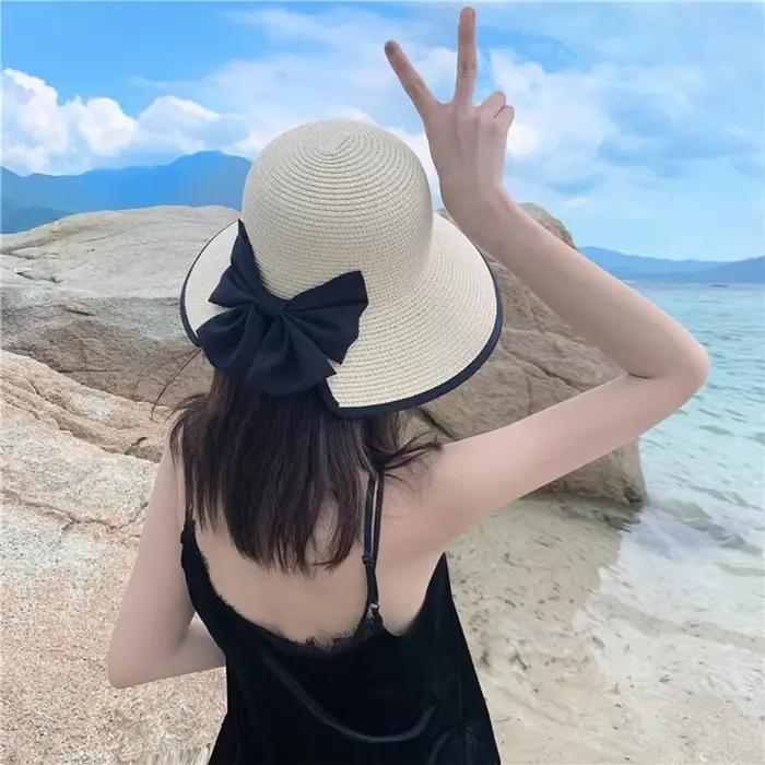 Chapeau de paille à large bord pour femmes avec nœud papillon