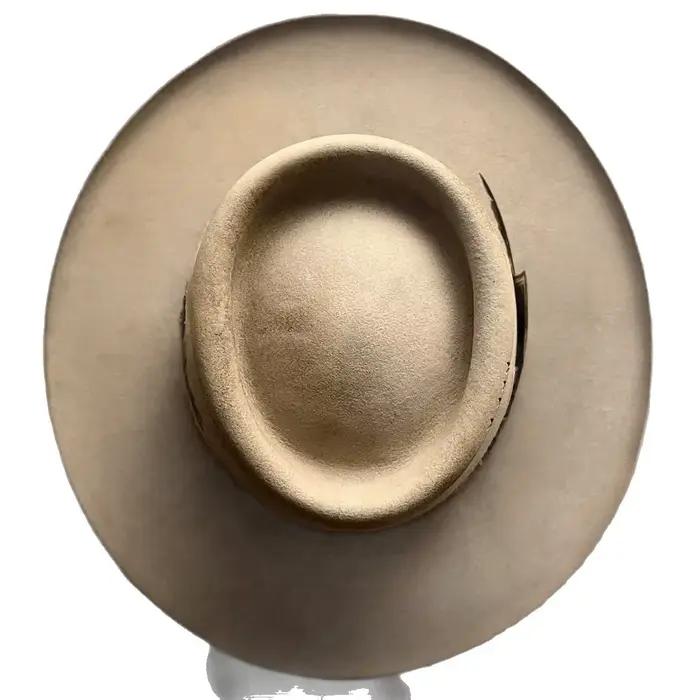 Chapeau en laine à la mode avec bord bouclé et anneau rond