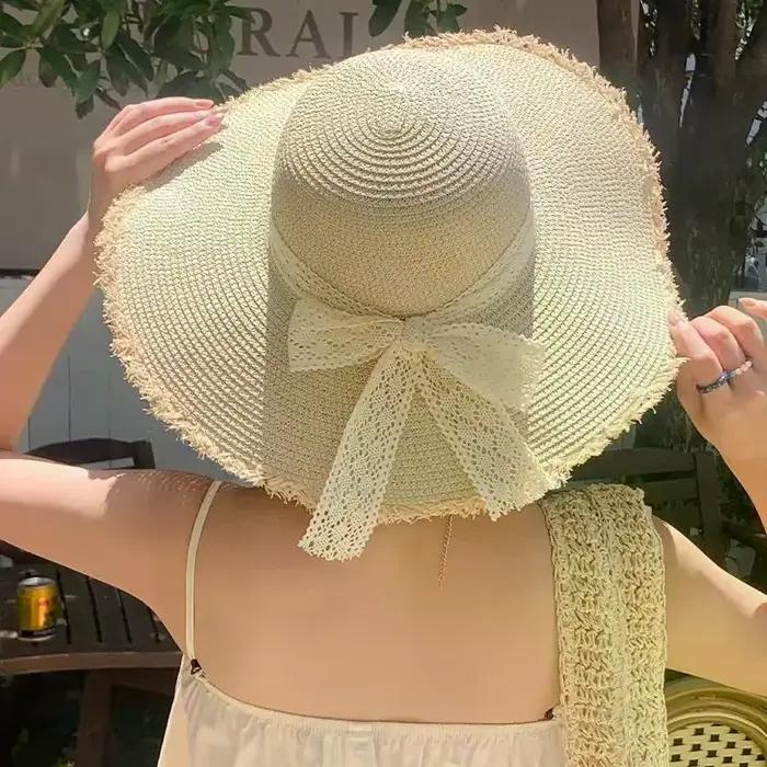 Chapeau de paille pour femme à grand bord avec nœud décoratif