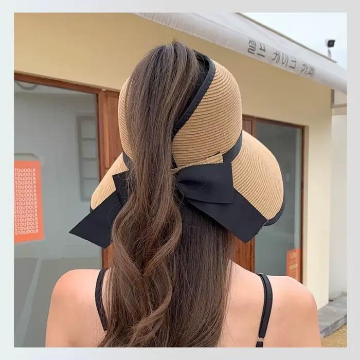 Chapeau de soleil élégant rond en paille pour l'été